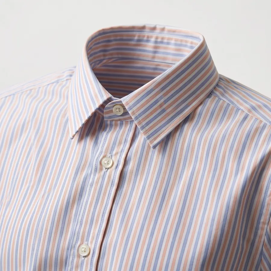 A close-up of the striped shirt collar and buttons